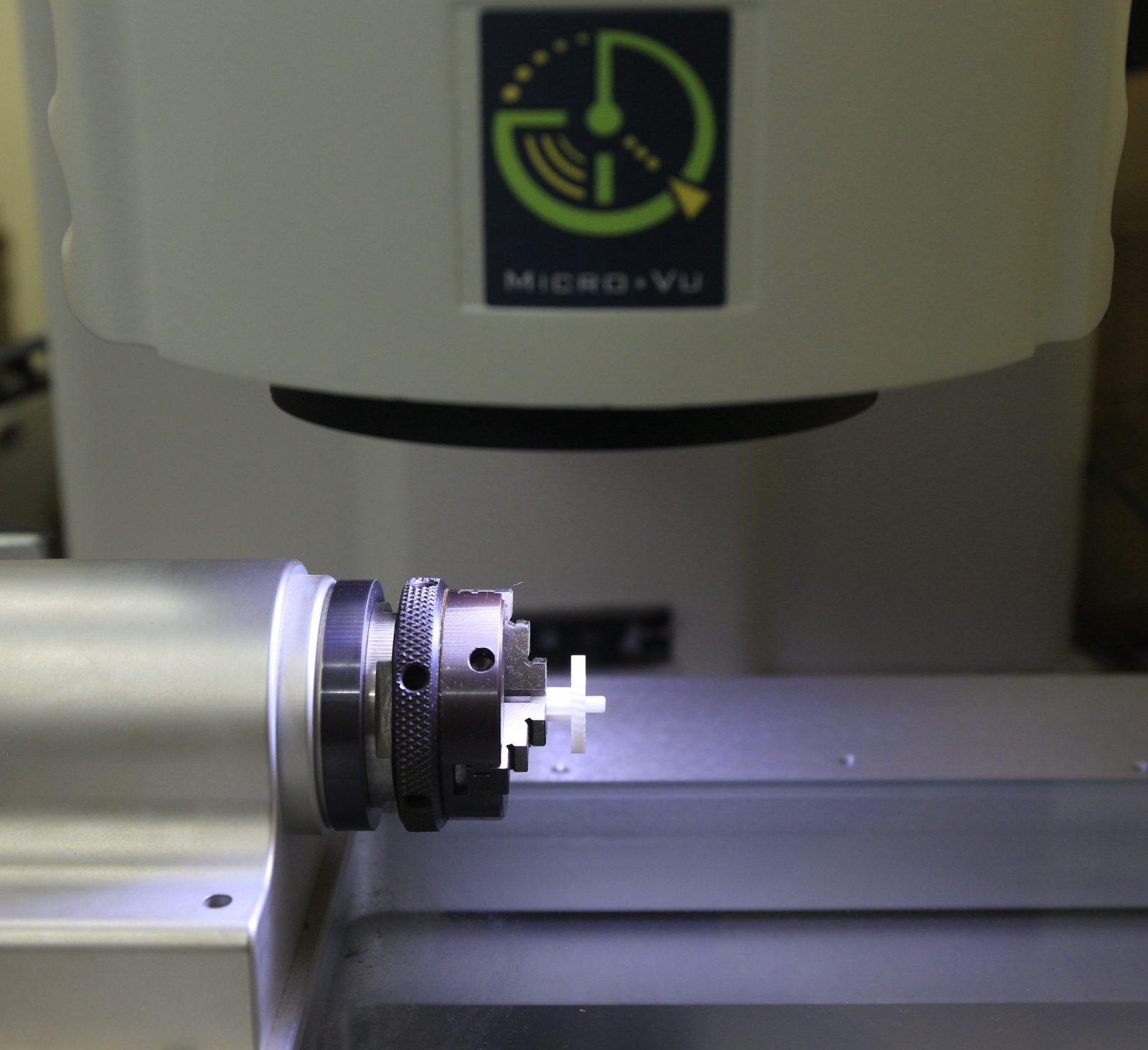 Micro-Vu vision measuring machine inspecting a molded part